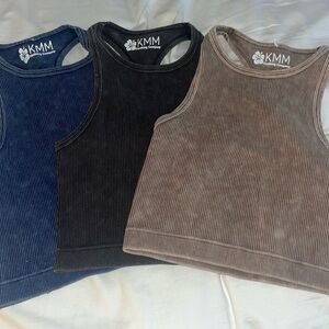 Three Pack of KMM shirts, size small.
